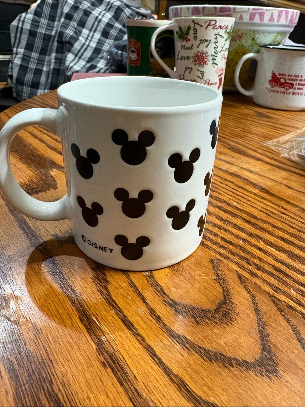 Disney white mug in EUC with black Mickey Mouse silhouette